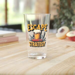 Glass with 'Escape Strategy' design on table.