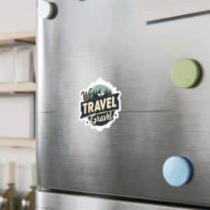 Refrigerator with 'We Travel Gravel' sticker.
