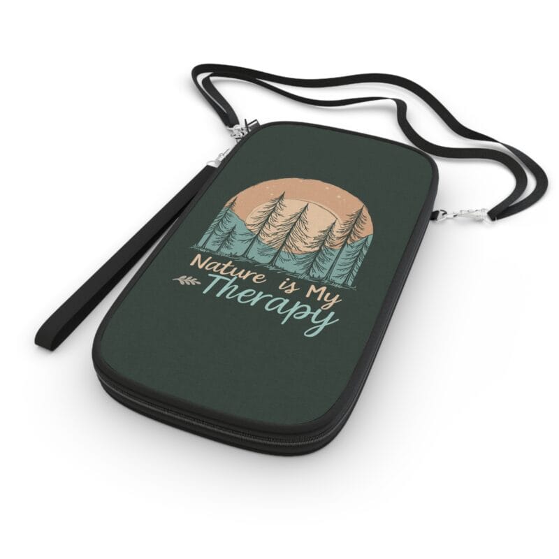 Nature-themed purse with tree design and quote.